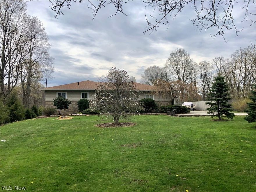 Custom built Ranch with walk-out lower level on 2+ acres with 30 x40 barn and 24x24 garage/outbuilding, pasture behind the barn and horses are allowed, possible 5 br home - 3 brs up and 2 in the lower level, lower level also has a full bath, large garden windows, a storage room and work room, master bedroom w/walk in closet, 3 full baths, 1st floor laundry, kitchen with granite and stainless steel appliances, two way fireplace from living room to dining area with french doors to a 15x30 deck, cherry woodwork thru out with 6 panel doors, real ceiling wood beams in the dining area, 
Property goes into the woods about 15 ft. per seller
Updates include Roof on the house 4 years young,  Roof on the garage 6 years young, Roof on the Barn 6 years young, septic has new leach bed and aerator system, well holding tank and pump newer, hooked up for C/A, furnace and hwt are newer 
One year America's Preferred Home Warranty paid for by the seller