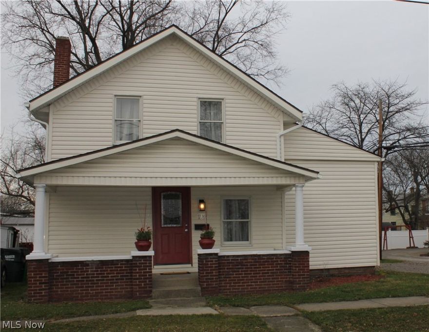 This completely renovated house has been transformed into a uniquely "modern" century-old home. Everything is new from top to bottom; roof, electric, plumbing, furnace, windows and more. As you enter the home through the front door with leaded glass window, you will appreciate the new carpet, paint and inviting atmosphere that has been created. This home provides a convenient first floor bedroom, full bath and laundry room.  The kitchen is fully equipped with gas range, refrigerator, microwave and dishwasher. Beautiful hardwood bamboo flooring flows from the kitchen to the laundry room and bathroom. The back splashes in the kitchen and bathroom have been enhanced with alluring glass tiles. The second floor has 2 bedrooms and a second updated full bath. A totally renovated 2-car detached garage with electric door opener sits behind the house on the extra deep lot. All the work in this home has been completed by professionals and it is move-in ready!