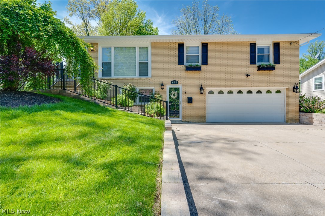 Amazing opportunity to own a well kept home in Ellet! This gorgeous raised ranch features 4 bedrooms and 3 baths! As you pull up you'll notice the well manicured landscaping and professional stone work that leads to the front door. Walking in, the open concept features a large living room with an abundance of natural light, a flow into the perfectly updated kitchen and dining room that features hardwood floors and access to the private back yard! Down the hall and privately tucked away are 3 of the 4 bedrooms and two full bathrooms.. All bedrooms feature large closets, natural light and newer carpet. The main bedroom has it's very own full and updated bathroom. Wait there is much more! The main level features a second full living room, another large bedroom and full bathroom. It also provides access to the 2 car garage and dedicated utility/laundry room. This beautiful home won't last long, so you better call and set up a private tour today!