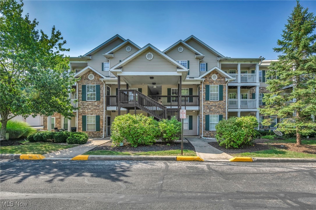 Just what you've been waiting for! This fabulous Strongsville condo has been freshly updated throughout, boasting a wonderful open floorplan, appealing decor, spacious rooms and an ideal location close to restaurants, shopping, and highways. The inviting great room offers vaulted ceilings, built-in surround sound, floating shelves and a lovely fireplace as the focal point. The large windows allow lots of light to spill in and there's access to your private outdoor balcony. The kitchen with its ample breakfast bar has been recently updated with an expanse of granite countertops, a handy pantry and lots of cabinet space, as well as a large dining area. The primary suite features a super-sized walk-in closet and a private bath, and the second bedroom also has a large walk-in closet and is just steps away from the hall full bath! There's a large laundry room in this unit, lots of storage, and a private 1- car detached garage with lots of guest parking and a community room add to the value. You will want to call this one "home!"