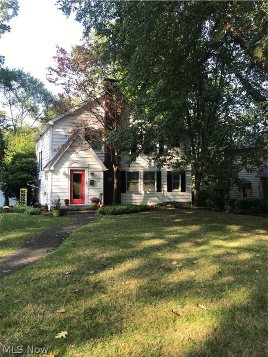 Welcome home to this very well maintained, updated 4BR, 3BA Colonial located is desirable Merriman Hills. Just a short distance to the towpath & Cuyahoga Valley National Park. Neutral & stylish throughout. Gleaming woodwork. Open living room with built in book shelves & fireplace provides a relaxing environment & leads into the perfect den/study/home office location. Enjoy the formal dining room with hardwood floors. Large eat-in kitchen with Corian countertops, stainless steel appliances & breakfast nook opening onto the private deck & flagstone patio in the partially fenced, private, treed back yard. En suite master bath with double sink allows for your privacy as family members & guests to enjoy the additional full bath. Rec. room, workshop, storage and laundry are located on the lower level. There is nothing to do but move in to this  property and make it your own. Additional features include front load washer & dryer, New Boiler, New Roof to be installed in October. This home is a