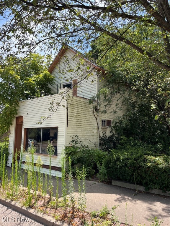 For investors or demo and lot use only. For sale, residentially used storefront home on Main St. Interior in need of complete renovation. Water and gas have been turned off for some time.