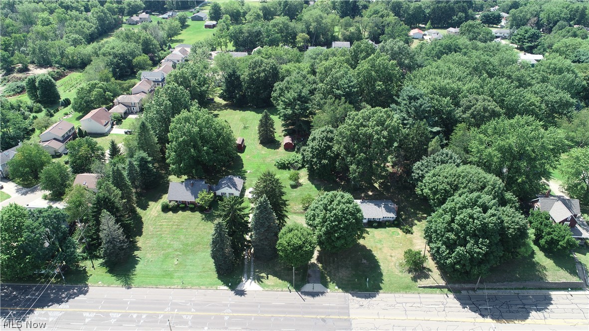 Multi parcel sale includes 8221 (1,482 sq ft) and 8251 (1,124 sq ft) Cleveland Avenue. 325 feet frontage along Cleveland Ave N. Across the street from Fisher Foods, Dad's Car Wash, First Ohio Credit Union and others.