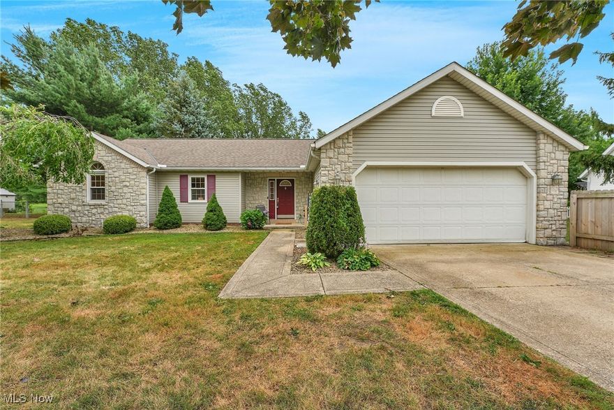 Welcome to this beautifully renovated ranch-style home, expertly remodeled by Petro installations LLC. This home blends modern style with everyday comfort. The vaulted family room features a warm wood shiplap ceiling and an abundance of natural light. Luxury vinyl flooring runs throughout the entire home, adding both durability and style.
The gourmet kitchen is a true highlight, offering shaker cabinets, granite countertops, floating shelves, walk-in pantry, and a massive island perfect for cooking and entertaining. The open floor plan flows seamlessly into the great room, which includes a gas fireplace and LED recessed lighting throughout.
The primary suite includes a walk-in closet and ensuite bath with ceramic tile flooring and a walk-in ceramic shower. A sliding door off the family room leads to a large TREX deck and flagstone patio with a walkway to a fenced backyard—ideal for outdoor entertaining or pets.
Additional features include an attached 2-car garage, paved driveway, storage shed, and a spacious laundry room with storage cabinetry. Built in 1995, this home sits on over half an acre in Madison Village, close to schools, shopping, parks, and public transportation. Central air, ceiling fans, and gas heat ensure year-round comfort. Don't miss out on this Madison Village gem!!