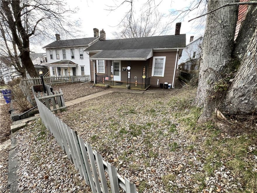Lovely 2-bedroom home with everything on one floor. This ranch-style home has a lot of character with a high ceiling, built-ins, natural hardwood flooring, a stone fireplace, and double sliding barn-style doors. Pet-friendly with a fenced-in yard. The laundry is located in the bathroom.