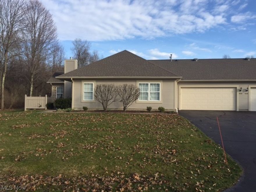 Canfield condo, peaceful setting, private patio faces woods, 2 bedrooms, 2 full baths.  Double car garage. Lots of potential