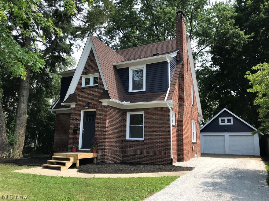 Immaculately Remodeled West Akron Colonial! Classic features & Charm meets updates from top to bottom! You will fall in love with this beautiful property from the street..and it just gets better as you walk through the front door. You are greeted by a spacious Living Room complete with wood burning fireplace with new mantle. There is a great open feeling and flow as you enter large Dining Room area off Kitchen..and lots of natural light. The Kitchen has plenty of space & storage and has been completely updated with new cabinets, stainless appliances, and gorgeous granite countertops! A Half Bath has even been added to the ground floor of this home.  The second floor brings three good sized bedrooms...one of the bedrooms includes an additional storage space as well as staircase access to an extensive bonus room that offers many possibilities..office, playroom, or just great extra storage space! The large second floor Bathroom has also been completely redone! Astounding list of 2021 upda