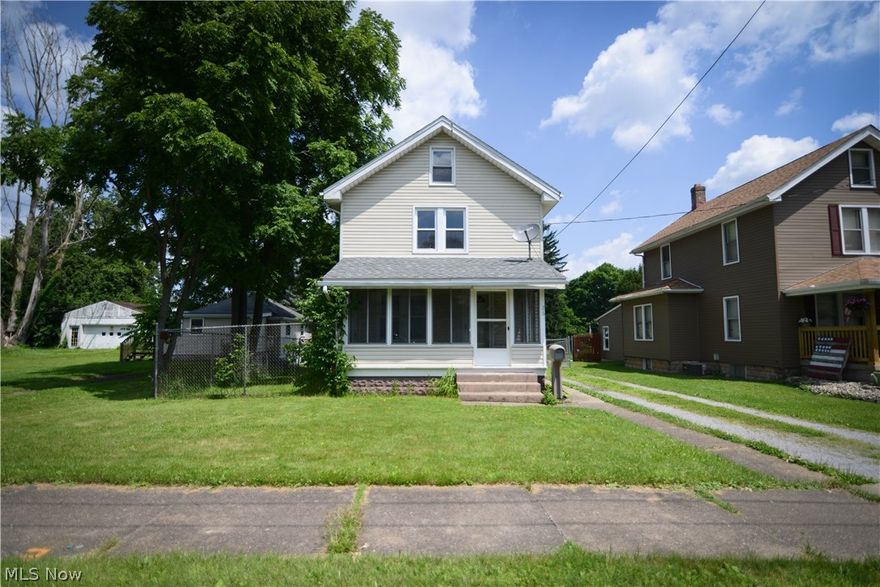 Wow!! What an excellent opportunity in Struthers! Vinyl Windows, Vinyl Siding! Brand new roof on the house in Summer 2017! This home has nice neutral paint colors plus brand new carpeting in the living room, and bedrooms! Walk in to a spacious living room with new neutral carpeting and gorgeous woodwork! Beautiful french doors open to the dining room with hardwood flooring, lighted ceiling fan  and great natural lighting! Kitchen with laminate flooring, lighted ceiling fan and slider doors leads to the back deck. There is also an Enclosed front porch to enjoy the warmer months! Beautiful wood staircase leads Upstairs to Two large bedrooms both with nice lighted ceiling fans and a full bath with claw foot tub. Huge attic for storage. The basement is unfinished, Newer water tank, glass block windows. Forced Air furnace. Laundry in basement. Extra storage room. Moving outside, the exterior is neat and tidy. Fenced yard gives a great extra feature as well as the detached 1.5 car garage! Al