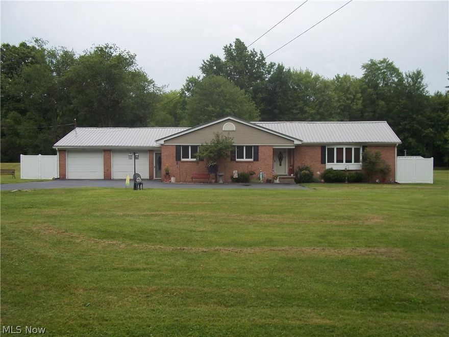 4 bedroom, 3 bath ranch on over 11 acres. Kitchen with bay window and raised panel cabinets, Formal Dining with beamed vaulted ceiling. Great room with brick fireplace, Florida Room with carpet and ceramic tile. Bar (wet) ) room with ceramic tile. 20X40 heated inground pool. Outdoor Kitchen with bar, His and hers changing rooms with bathroom. 20X40 barn with 20X40 lean. Great horse property.