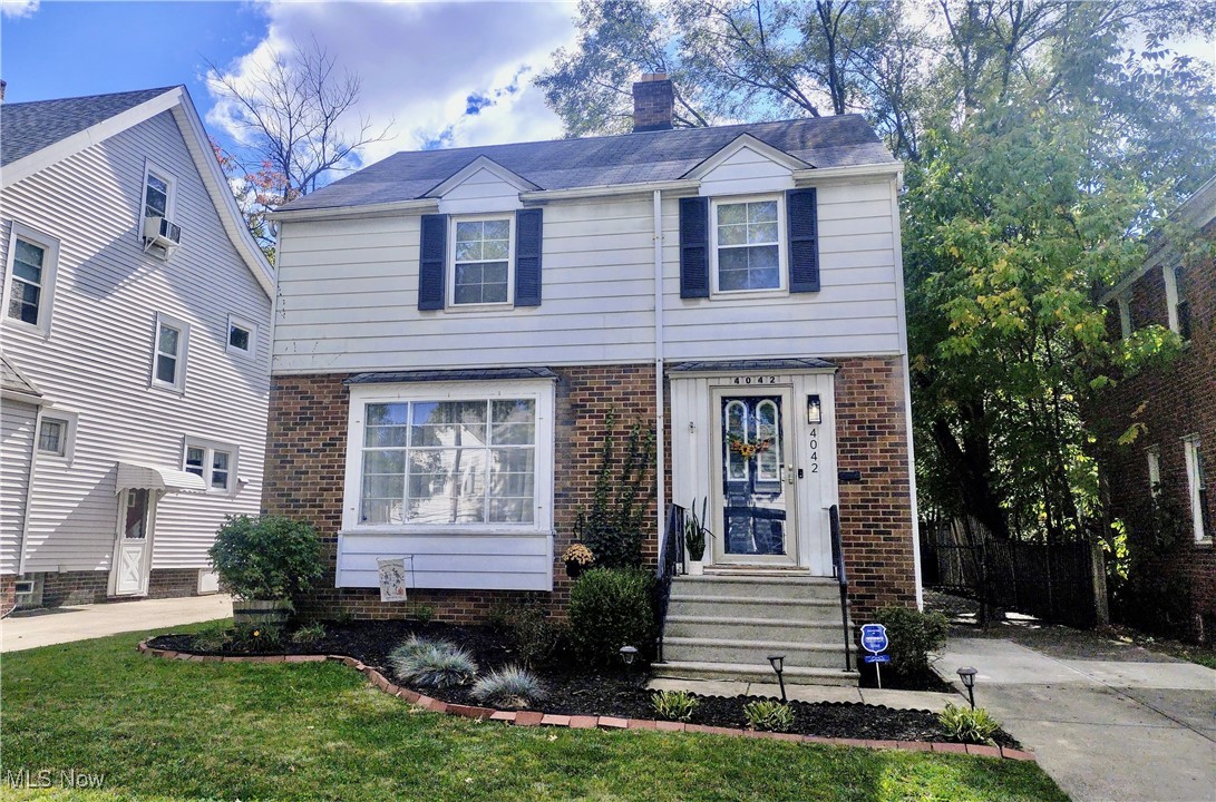 This gorgeous colonial is updated and move-in ready! The kitchen has been recently modernized with large ceramic tile flooring and all newer stainless steel appliances; it's also equipped with the cutest eat-in dining area. The formal dining room flows into the living space which features beautiful hardwood flooring and a gas or wood burning fireplace. You will love the second level where you'll find three bedrooms and the full bath, all with hardwood flooring and lots of closet space throughout. Bathrooms have also been updated with a fresh appeal. Third floor accessible with staircase and would make a great bonus room if finished. Just bring your creativity! The finished portion of the basement has a second fireplace (with an electric heater) and would make a great entertainment/ game room. It's currently being used as a home office space. Plenty of storage space and newer washer/ dryer are in the other portion of the basement. A well maintained and manicured yard is easy to enjoy from the three seasons porch on the back of the house. It's a serene setting with the privacy fence that can be totally enclosed. Additional updated include roof ice guards, New AC '22, back steps to porch, and new lighting throughout '23. Situated minutes from University Circle, Cleveland Clinic, UH, CWRU, John Carroll and Little Italy.