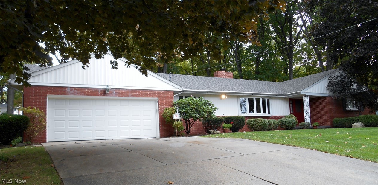Large 3 bedroom, 3 bath brick ranch on quiet cul de sac in Colonial Hills. Enter the large center hall foyer with lots of closet space to the formal living room and dining room. The eat in kitchen flows into a sun room/family room with built ins and fireplace. Down the over size hall is the 13'x17' master bedroom with full bath and double closets. Two more bedrooms and a full bath complete the first floor. The lower level has a 14'x33' family room with wet bar and another full bathroom. The oversized 2 stall heated garage with additional storage completes this great property. New roof 2014, from an estate, ready for your personal touch. Comes with a home warranty.