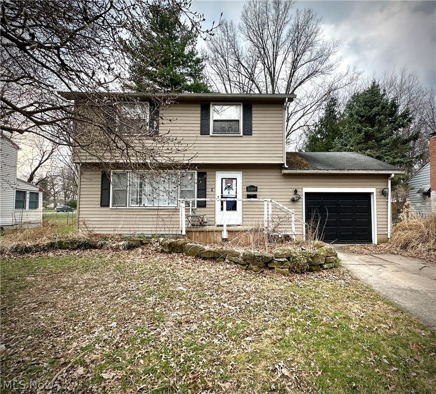 Austintown home featuring updates including updated laminate flooring throughout the first floor and a beautifully renovated kitchen with ample cabinet space, a stylish subway tile backsplash, a large single-bowl sink, and gold brass fixtures. Kitchen opens to a formal dining area with French-style doors leading to a back deck and a spacious backyard with storage shed. Upstairs offers three spacious bedrooms and an updated full bath, while the downstairs finished basement provides rec area, laundry, additional living space with two potential bedrooms. Motivated seller.