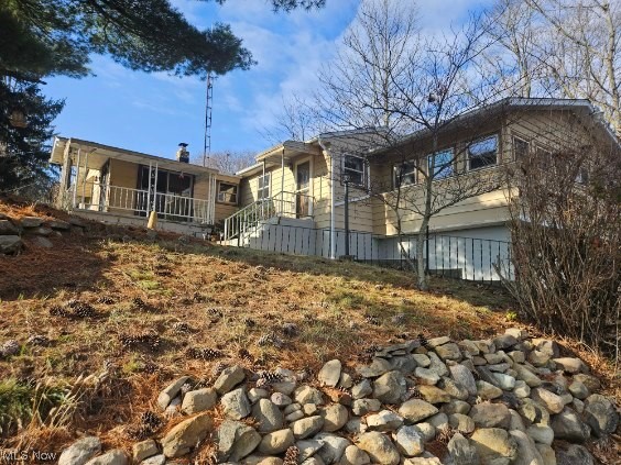 A great opportunity here! For starters...you won't find another lot like this one in the city! This is a double lot (2 parcels) and it has a HUGE backyard! (Parcel 68-08967 is 85x236) This 3 bedroom home has loads of potential and room to expand! The kitchen has been nicely updated and includes appliances. There is a cozy family room with sliding glass doors to the L shaped sunroom that would be a great home office space, exercise room or just an area to relax in! There are 3 bedrooms on the main floor and a nice size full bath with a built in vanity area. The lower level has a finished room that would be a good workshop or craft room and there is also a laundry area and lots of storage space! There is an attached garage with an added storage space as well! The house is situated nicely and overlooks the backyard. If you are looking for something with a large lot then this just might be the house for you! Located on a quiet street and minutes away from shopping, eateries and expressway access.
