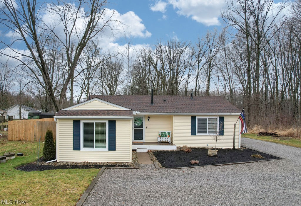 Welcome Home to 9324 Avon Belden Road in North Ridgeville! Step through the front door and you will notice that this open concept home beams with natural light! The high ceilings with recessed lighting keep the home bright and cheery even when the sun goes down! Step into the kitchen featuring granite countertops with a granite island! Off of the kitchen you have space for dining as well as a large living area! The primary suite is nicely tucked to one side of the home and includes it's own full bath with stunning shower! Additional two bedrooms with another full bath can be found off of the living area. The entire home is updated and modern! Out back you have your own private oasis complete with large patio. Also yours to enjoy is the oversized detached 2.5 car insulated garage with electric and automatic garage door openers to both sides. So many updates including a new roof 2019, new siding 2019, updated kitchen 2019, and hot water tank 2019. All appliances stay (including the washe