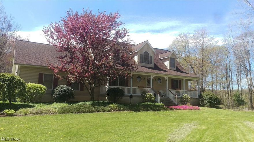 " Home is located well off the road in a private, secluded setting." Welcome to this 3 bedroom, 3 bath younger home in fantastic condition. Enter into the 2 story foyer with wood floors. Move right into the spacious 2 story living room with a fireplace which looks out over the backyard. The 1st floor Master suite has a spacious bedroom with a master bath with a double bowl granite vanity. a huge soaking tub, tile shower and a private water closet. The spacious eat-in kitchen with granite counters has an eating area to look out over the backyard, with the formal dining room right off of it. 1st floor laundry right near the kitchen. 2 private bedrooms up. Huge finished basement  for relaxing, also has a bar and an office. What more could you want? Outside over 7 mostly wooded acres for your personal enjoyment with a deck, shed, pool and a pond.. A 2 car attached garage and a 2 car detached garage, plenty of room for cars or work area. One of the finest homes with land in Madison!