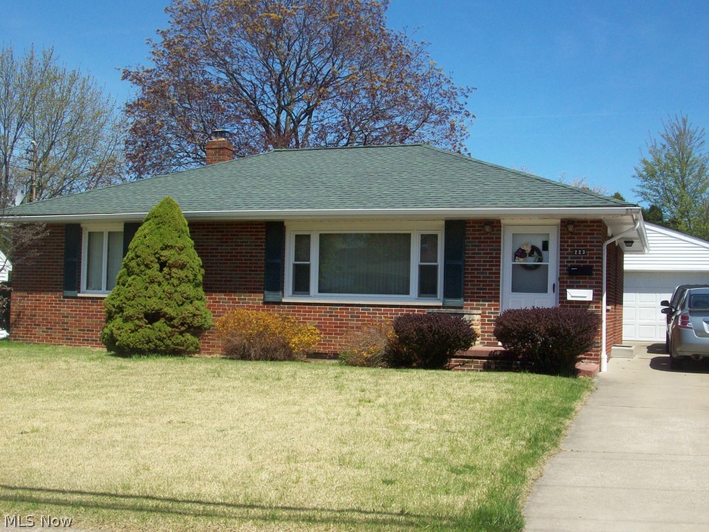 Don't miss this updated, low maintenance, all brick ranch with a detached 4 car garage! Car buff or hobbyists paradise. This home has been well cared for and is move-in ready. Larger than it looks, featuring a spacious living room and eat-in kitchen and nice size master bedroom. All kitchen appliances will remain for the new owner. The large family/rec room in the lower level is carpeted and features a built-in bar...great space for entertaining, dining, or just relaxing...also space for a 3rd bedroom. Shelving and built-in closets provide abundant storage. A handy shower and large laundry area complete the basement. Updates include: newer roof on house and garage, newer furnace, central air, water heater, bath, kitchen floor and storm doors. A patio and private yard for your outside enjoyment complete this special home. Truly a must see to appreciate! Close to shopping and easy access to the expressway. Also includes parcel #6855803. SPRING now and spend your next summer here!