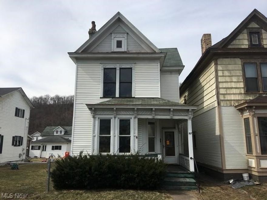 Large unique older home has living room with fireplace, dining room, kitchen, 1st floor laundry, 3 bedrooms, one and a half baths and full basement.