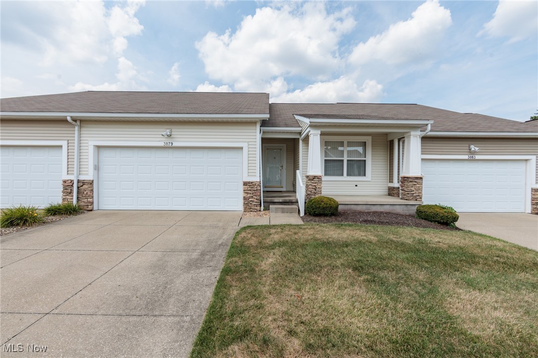 A lovely Brittany Commons condo that has first floor living at it's finest. This 2 bedroom, 2 full bath unit also has a full basement. A large great room has a gas fireplace. The open concept offers multiple dining areas, that are off of the open kitchen. There is a first floor laundry, attached 2 car garage with water, ample storage, and much more.