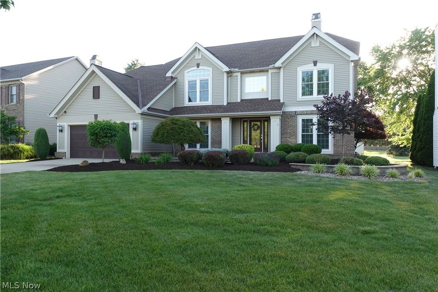 This well-maintained colonial has had almost everything upgraded within the past 10 years. The eat-in kitchen features soft close cabinets with microwave drawer, built-in double oven and an induction cook-top. It is adorned with lavish granite counters, engineered hardwood floors and all stainless-steel appliances. There is plenty of cabinet space, counter tops and a Butler's pantry for entertaining. This opens to a 2-story great room with pass through gas fireplace and surround sound built right in. The wall of windows, with second story auto blinds, allows for plenty of natural light any time of day. There is a living room with cozy fireplace that is perfect to unwind or read a good novel. The formal dining area can accommodate most any sized table and is perfect for hosting on special occasions. The upstairs has three large bedrooms, a full bath and a large master suite with full remodeled glamor bath. There is a beautifully tiled extra-large shower, a free-standing soaking tub, and