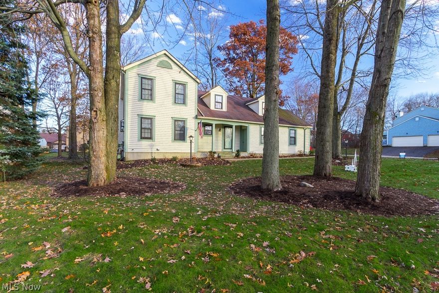 Spectacular setting for North Canton condo. Beautiful trees, lots of shade, and very convenient! Features 2 bedrooms and 1.5 baths, semi-open floor plan, full basement, garage, beautiful yard, and large deck with sliding door to family room. Master bedroom has his/hers closets and bathroom access.  Condo has access to pool and club house.