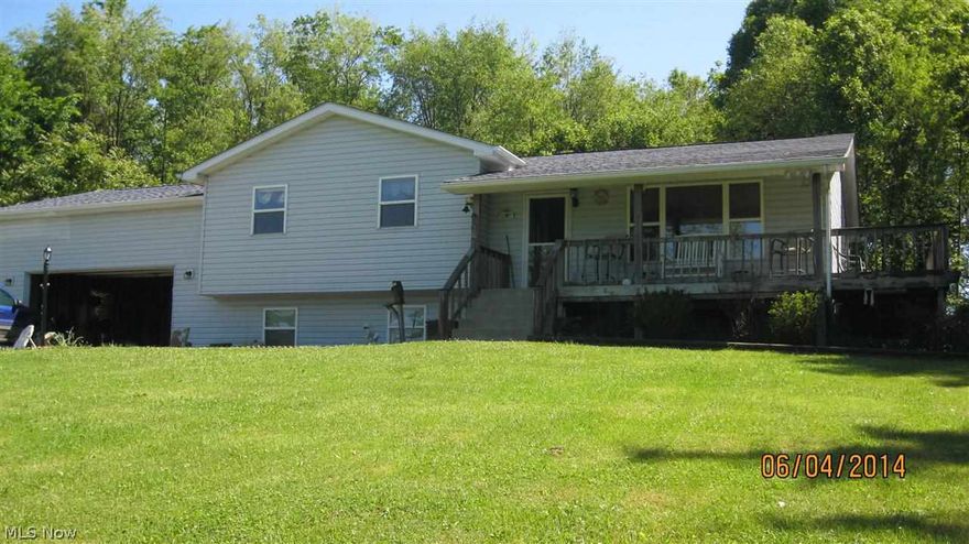 Beautiful home in the country on 1.76 acres. Gas, Oil & Mineral rights transfer. Tastefully decorated in move-in condition.