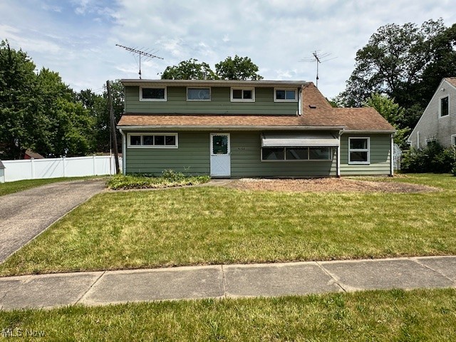 "Looking for a home close to shopping and dining? Look no further! Welcome to this 4 bedroom home boasting an oversized 2 car garage in the heart of Cuyahoga Falls just waiting for your finished touches. 2 bedrooms, a full bathroom, and the laundry are all conveniently located on the first floor. The second floor offers a spacious primary bedroom as well as a 4th bedroom and full bathroom. An addition running the length of the house would make for a great room to gather with friends and family. Enjoy the warm summer nights sitting on the back enclosed patio overlooking the larger back yard. Don’t miss the opportunity to make it yours!