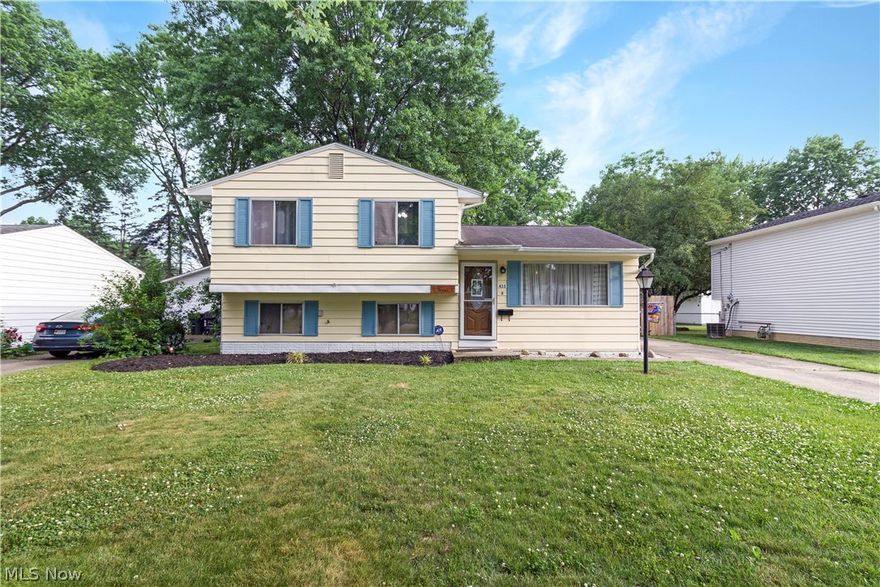 Cute little split level on a tree lined street in Elyria.  Nice curb appeal.  Open floor plan and high ceiling on the main floor.  Right now its set up as a kitchen and dining room but could be additional living room.  Refrigerator (2023) and Stove stay.  Upstairs offers three bedrooms and a full bath.  Family room and laundry/storage on the lower level.  Washer and Dryer (2023) stay.  Back yard has a full wood privacy fence that is perfect for all your summer activities.  Large 2 car garage.  Nothing to do but move in!