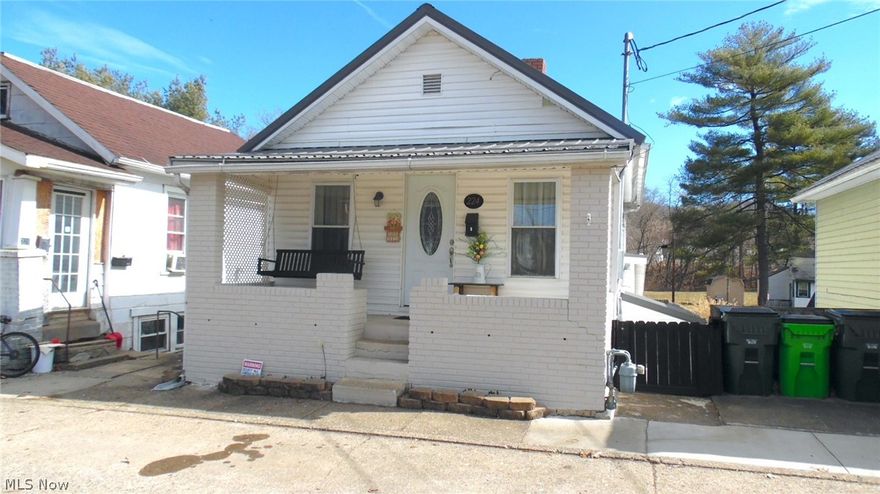 This hime is a total doll house and is in move in condition. Many recent updates, including kitchen flooring and counter tops. This home features 3 bedrooms with full bath and utility on main floor. Also included is enclosed screened rear porch plus concrete patio. This home has a large fenced yard with ample off street parking.