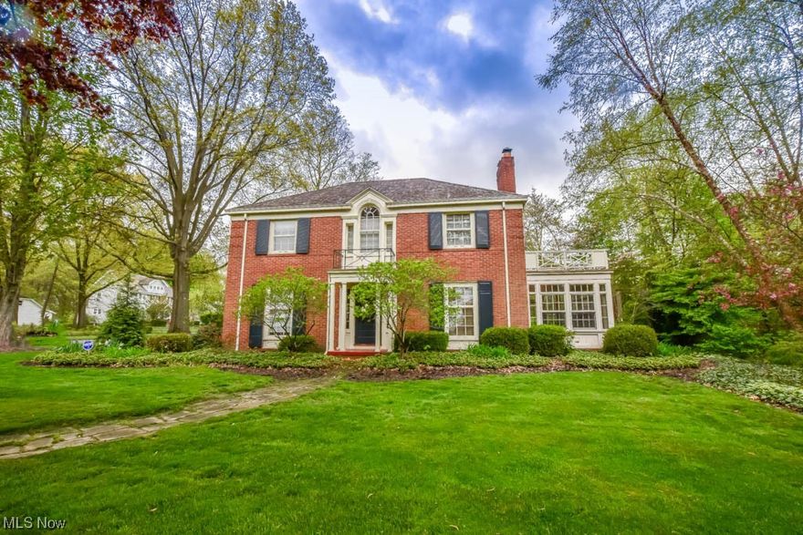 This stately Georgian colonial has been lovingly cared for by its current owners for over 30 years! Step inside and you'll be immediately drawn to the gorgeous cherry kitchen, featuring a center island with cooktop and counter seating, bay window with window seat, and ceramic tile flooring. The open-concept design seamlessly flows into the dining room, which boasts a built-in corner display cabinet, perfect for showcasing your favorite decor or china. The spacious living room is equally impressive, complete with crown molding, a built-in corner cabinet, and access to the enclosed side porch. Need a home office? This home has you covered, with an integrated desk, bookshelves, exterior entry, and use of the guest bath. Upstairs, you'll find 4 large bedrooms with hardwood flooring and 3 full baths including the master with an en suite boasting a separate tub and tiled shower. Even more living space in the finished lower level rec room with another fireplace plus a bonus room with so many