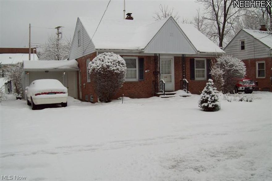 Offered for the first time in over 60 years this is a well maintained two bedroom solid brick home.  With newer kitchen, large family room with gas fireplace and large windows overlooking the backyard with newer chain link fence.  The electric has been updated.  Plenty of storage in the walk-up unfinished 2nd floor and in the full basement.  Close to everything.  Don't let this one get away.