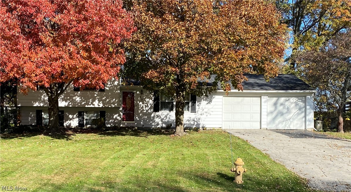 Welcome home to 433 Stewart Ave NW located in Champion this bi level home is ready to be yours. This residence with a wooded back yard view located in a subdivision with four bedrooms and two full bathrooms will not stay on the market long. The main level of this home incorporates a generously proportioned kitchen complete with built in pantry. The addition of a master bedroom on the main level of this home that has a full bath and built in closet makes this home complete. The upper level of this has three bedrooms and another full bathroom. The lower level of the home has not one but two areas perfect for a rec room and the ability to add an additional fifth bedroom as well as a separate laundry room. If you are looking for an abundance of space look no further this is the home for you. Call today for your private showing.