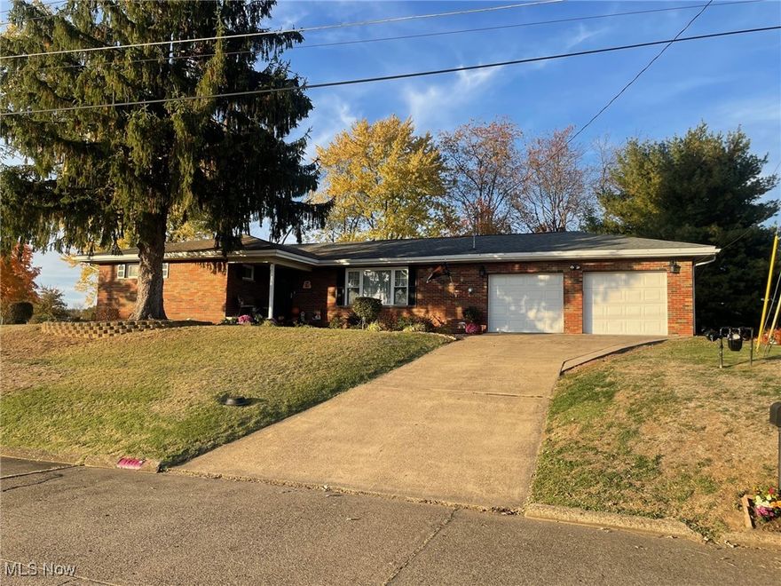 First time available on the market! This stunning brick ranch-style home is being offered solely due to relocation. Nestled on a peaceful dead-end street, the property features a generous kitchen, dining, and family area combination with heated floors, ample cabinetry, and counter space, leading to a delightful three-season room perfect for relaxation or entertaining. Upon entering, you'll find a spacious living room adorned with recessed lighting and French doors that open to the entry and kitchen area. The lower level includes an additional family room, an office currently used as a bedroom, as well as an extra full bath, laundry room, and storage space. Numerous updates have been made over the years, and this home has been meticulously maintained.