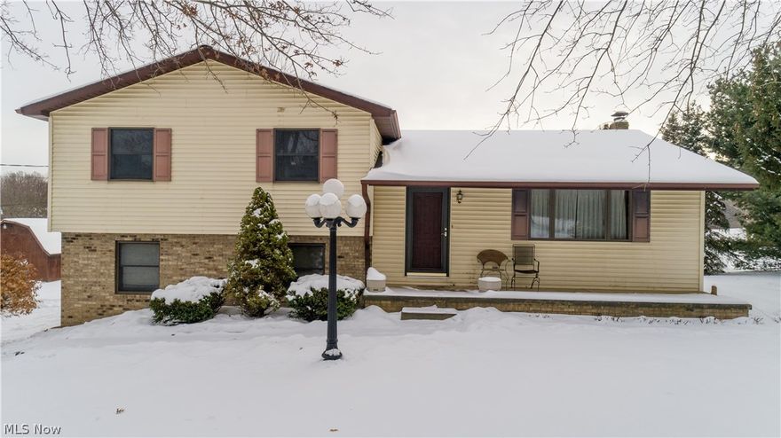 What a deal! This well-maintained split level sets on a quiet 1.5 acres in Shalersville Twp.  Oversized 2 car garage, 3 bedrooms, and plenty of living space accompany this home! Kitchen has been updated since purchase and finished lower level.  New paint and carpet throughout.  Home is being sold as-is as part of an estate sale.  Septic was inspected and passed, this home is priced to sell quick.  Call today for your private showing before this one is sold!