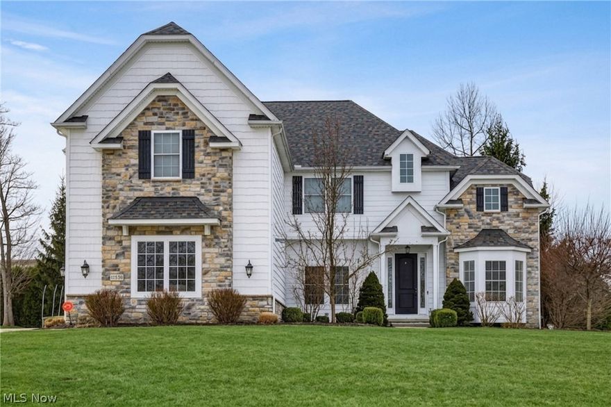 Gorgeous custom contemporary home located in a highly desirable Nature Preserve North neighborhood! This home is situated on a quiet cul-de-sac! The impressive first floor welcomes you into the two-story foyer. The open dining room flows into the great room, featuring 10 feet ceilings with floor to ceiling windows allowing for natural light, custom built-ins and a gas fireplace. A private work-from-home office with French doors off the foyer offers the perfect workspace. The chef’s kitchen is designed for both cooking and entertaining, complete with granite countertops, a large island with breakfast bar, walk-in pantry with built ins, double ovens, coffee station, and an eat-in area. Just off the kitchen is an additional sitting area with a two sided fireplace that leads to a covered stamped concrete porch—perfect for relaxing or hosting guests. There is an additional lower paver patio. The second floor features an oversized primary suite with room for a private sitting area. The luxurious primary bath offers double sinks, a soaking tub, makeup vanity, and a large walk-in closet with built ins. There are four additional bedrooms, one bedroom includes a private en-suite bath, while two additional bedrooms share a Jack-and-Jill bathroom. A large fifth bedroom provides flexible space for guests or family. The finished lower level is ideal for entertaining, featuring five built-in televisions, a half bath, a dedicated workout room with mirrors and rubber flooring, an additional craft room or home office and a dry bar for entertaining, A whole-house sound system enhances the entertainment experience throughout. Hot Water Tank 2024, Dishwasher 2024, Microwave 2024, Washer/Dryer 2018, Double Ovens 2018, Kitchen Faucet 2026, Interior of home has been painted 2026. water pressure control system 2026. 
basetball hoop has half court markings on the driveway, Do not miss this incredible home!