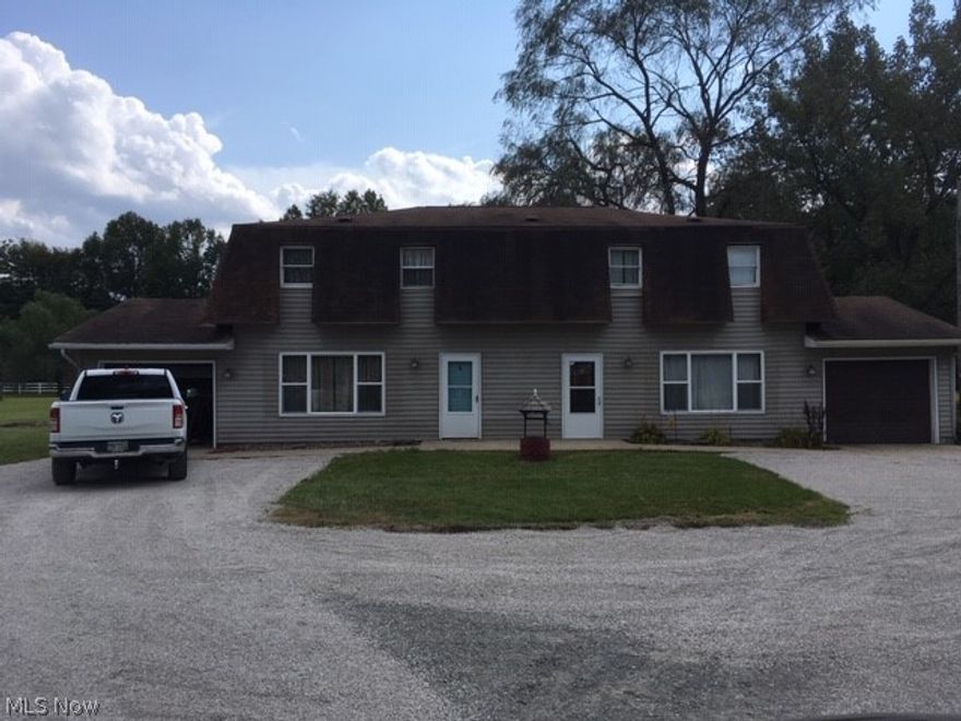 What a find, you can move into one side, the other side should almost make your payment! Empty unit has new carpet, new oak trim & new oak staircase some new electric units. Spacious living room, dining room & eat-in kitchen. Newly painted. Huge yard. Move-in ready. Updating the septic paperwork has been started.