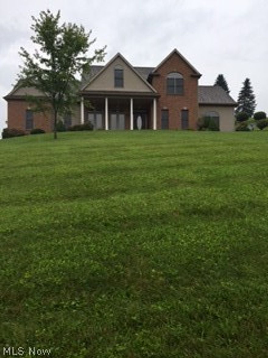 ALOT OF SQUARE FOOTAGE FOR ONLY $215,000   Great view, 4 bedrooms, 3 1/2 bath, Jack and Jill bath,  3 car attached garage that is insulated and dry wall finished to code, new garage door and opener,  formal dining room, large eat in kitchen, great room with 21' ceiling, large windows with natural light.  Dual climate with 2 furnaces and central air.  Master suite with his and hers walk in closets.  City water and sewer, 2x6 exterior walls, 13 course basement, architectural touches.  Fresh paint, new carpet, new floating floor in foyer and kitchen.  Granite countertop, plumbing in basement for bathroom. Finish the basement for additional family room.   2,532 above ground square footage finished living space. This is a beautiful home in MOVE-IN CONDITION. Make an offer today