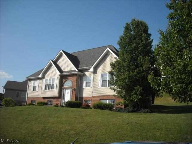 Location, location, location! Move-in ready home with 12 foot ceiling in living room. Eat-in-kitchen with pantry and formal dining room with trey ceiling. 3 Bedroom home with possible 4th bedroom or rec room in basement. Master features trey ceiling and master bath includes vaulted ceilings and separate tub and shower. Fresh paint and newer blinds. 2 Car Garage with workshop space. Refrigerator, Stove, Microwave, Dishwasher Included.