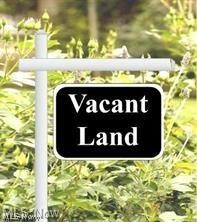Great opportunity for a homeowner, builder or investor. This parcel offers 16.98 acres zoned residential. Beautiful wooded land offers wonderful privacy with plenty of wildlife. Come build your custom dream home in the woods... or explore development options. Call agent today.