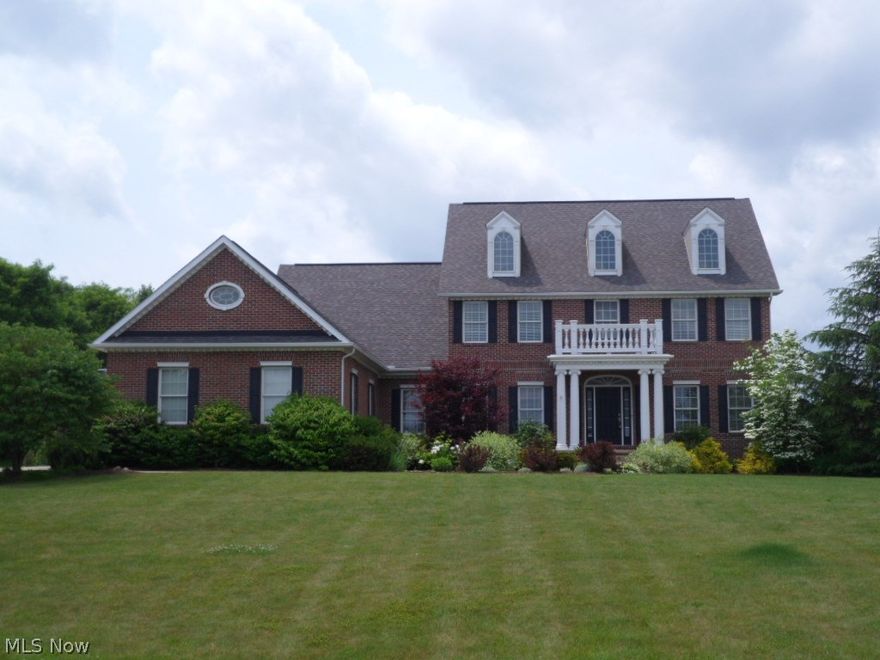 Beautiful colonial in The Reserve at Kings Ridge. 2 Acre lot on a Cul de Sac. HIGHLAND SCHOOLS. Enter the foyer where the spiral staircase leads to 3 bedrooms, 2 full baths and a room that could be a 5th bedroom or an office with a second staircase to the downstairs. First floor master with his and her walk in closets. Master bath with large walk in shower and claw foot tub.  French doors open up to first floor office with custom bookshelves and judges paneling. The Gourmet kitchen features Granite countertops, gas or electric countertop range, Stainless steel appliances and Brazilian cherry floors.  Great room with fireplace and door leading to the deck. Nice large partially finished basement and partially unfinished with built in storage shelves.  2 Car heated garage. Very nice private yard. Located close to shopping, restaurants, and major highways.  Seller offering Home Warranty!