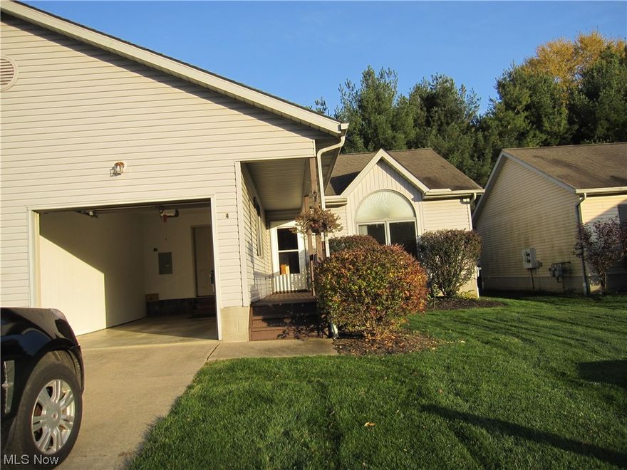 Move in Ready 2 bedroom, 1 bath ranch condo with an open floor plan, cathedral ceiling and 1 car attached garage.  All appliances stay.  Newer washer/dryer, hot water tank and bathroom skylight together with the back screen door.  The 2nd bedroom was updated with paint and carpet less than a year ago.  Most light fixtures have been changed over to LED and also under cabinet LED lighting has been installed in the kitchen.  To top it off,  there is a front porch and a back porch to enjoy.  Nothing to do here but move in.  Call your realtor today to make an appointment to come and see this move in ready ranch condo.