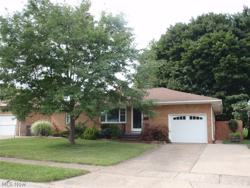 Neat and clean brick ranch on Elyria's west side.  Good sized kitchen includes stainless steel appliances - range, refrigerator and dishwasher.  Updated bathroom including tub surround and shower, vanity, toilet and flooring.  Full basement is unfinished, but has additional toilet and shower (water lines for shower need to be re-installed).  Backyard has privacy fence along east and west sides and then chain link across the back.  Rear covered patio is great for relaxing or grilling and affords privacy.  Walk up attic is accessible from door on west side of the garage.  Attic is floored over the garage and part of the home.