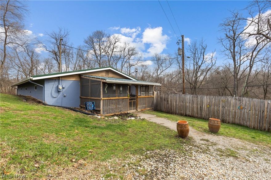 Tucked away in the quiet countryside of Harrison County, this charming property offers the kind of lifestyle many people dream about but rarely find. Less than 10 minutes from beautiful Tappan Lake, this property blends peaceful rural living with outdoor adventure right at your doorstep. Set on 2.27 acres, this inviting single-story home welcomes you with an open floor plan that makes everyday living feel bright, comfortable, and connected. The great room is the heart of the home, where a wood-burning fireplace creates the perfect spot to gather on chilly evenings or unwind after a day outdoors. Major updates offer peace of mind, newer windows, gutters, hot water tank, and a high-efficiency heat pump, making the home both practical and efficient for years to come.  The acreage is thoughtfully set up for country living with a 20x30 pole barn/garage with a 10x30 lean-to, a chicken coop and chicken run, dog kennels, and a swing set ready for play. Summer days are easy here with an above-ground pool for relaxing and entertaining. Nature lovers and homesteaders will appreciate the variety of fruit trees and bushes already growing on the property, including peach, plum, apple, blackberries, grapes, and elderberries. Whether you envision gardening, raising animals, or simply enjoying fresh fruit from your own backyard, the groundwork is already in place. For outdoor enthusiasts, this property could easily become your favorite hunting retreat, weekend getaway, or full-time homestead. And as an added bonus, the mineral rights currently under lease and producing royalties will transfer to the new owner, providing potential additional income. If you’ve been dreaming about a place where you can slow down, spread out, and enjoy country living while staying close to Tappan Lake recreation, this property may be exactly what you’ve been waiting for. Come experience the space, the setting, and the possibilities that make this property truly feel like home. Call to schedule today!