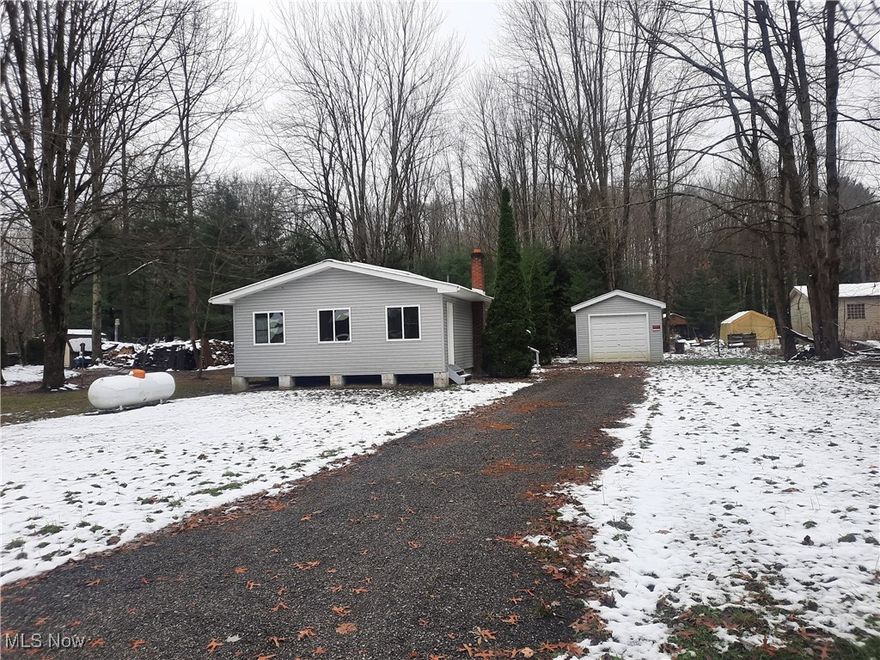 Pennview allotments.  Newly remodeled in 2022.  Home has 2 bedrooms, 1 full bath. Kitchen has new cabinets. Heater in the Livingroom, Stove and Hot Water tank, runs off of propane. Refrigerator runs off of solar system. Baseboard heat in Bedrooms and bathroom is available. Located about 1300 feet from Pymatuning Lake. New single car garage was built in 2024. Move in ready.