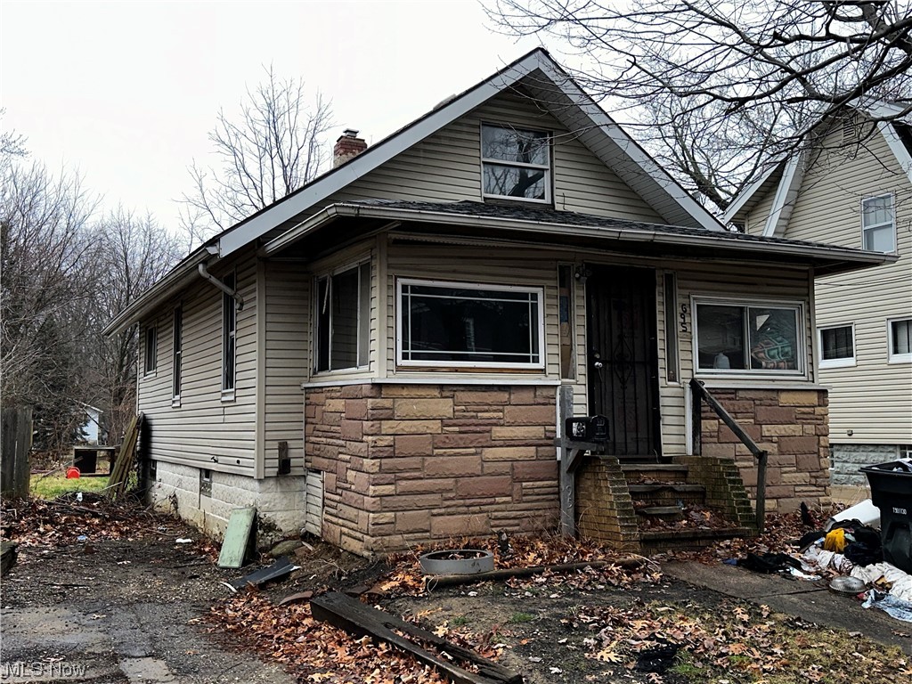 Investor Special! A fixer up with potential. Needs work, but has great upside. 2/3 bed with an enclosed porch and full basement.