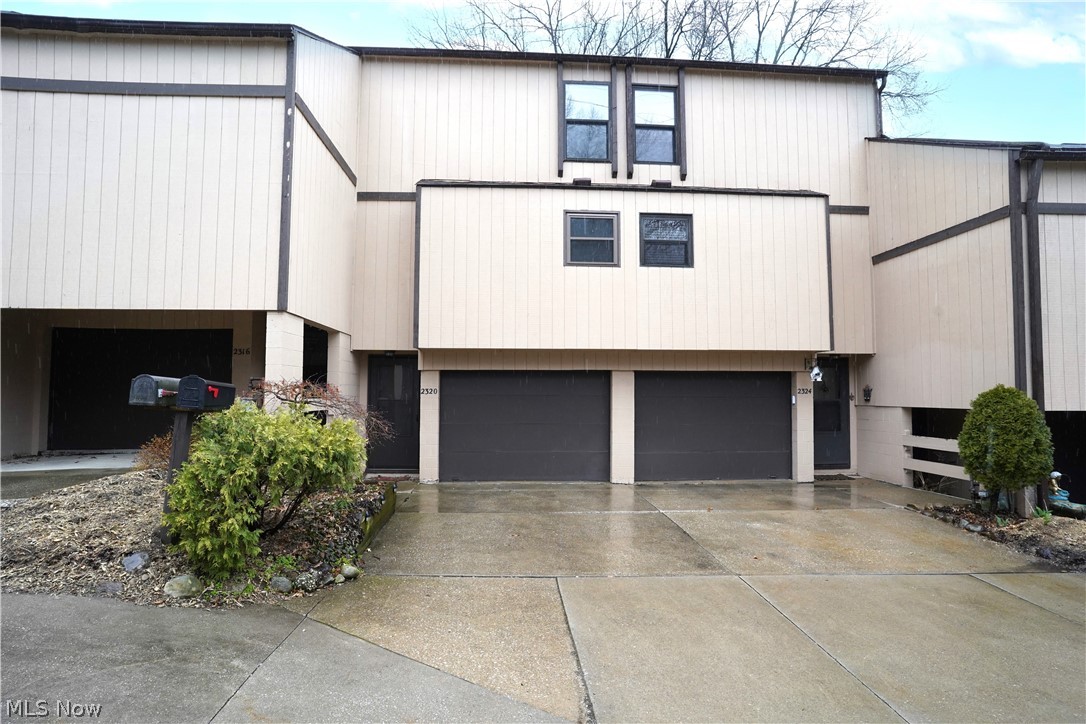 Whether you're looking for your first starter home or to downsize, this 2-bedroom, 2-bathroom condo in Cuyahoga Falls presents an ideal blend of comfort, convenience, and even has investment potential! You are welcomed into the living room with a large picture window allowing for natural light and sliding doors leading to your own private outdoor space! Make your way into the kitchen that provides plenty of counter space and cabinets that wrap around the room! The half bathroom is conveniently located on the main floor as well! Upstairs you will find 2 bedrooms and the full bathroom featuring a shower/tub combination! This home offers a freshly painted interior, central air and an attached 1-car garage! Conveniently located near local shopping, restaurants, parks, and the beautiful Cuyahoga River! Don't miss this opportunity!