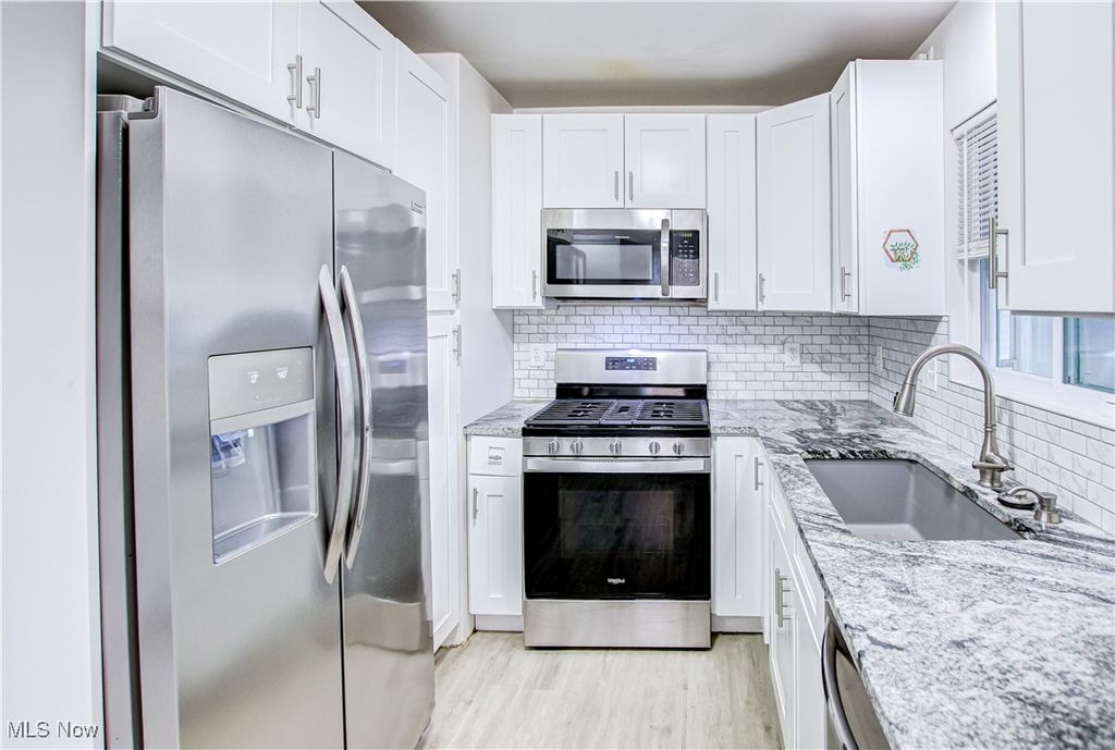 Photo of 11916 Wayland Avenue, Cleveland, OH 44111 (MLS # 5178482)