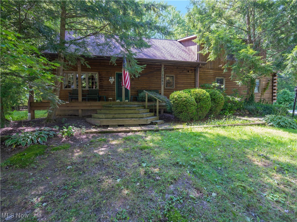 Welcome to this Charming Log Home nestled on 5 serene, wooded acres. This beautifully crafted rustic log home offers a warm, inviting atmosphere with all the modern comforts you need.
The home features 3 spacious bedrooms, including a first-floor master suite, and 2 full baths plus 2 convenient half baths. You’ll love the expansive cathedral ceilings and the open-concept living room, complete with a cozy fireplace—perfect for relaxing evenings or entertaining guests.
The kitchen boasts ample counter space, a breakfast bar, and all appliances included, making it ideal for everyday meals and hosting. Enjoy year-round comfort in the enclosed, heated porch, or step out onto the back deck featuring a second outdoor fireplace, ideal for gathering under the stars.
Upstairs, you’ll find two generously sized bedrooms with an additional staircase to garage, a full bath, and an additional lofted living area that overlooks the main floor, offering flexibility as a lounge, home office, or playroom.
The unfinished basement has high ceilings, ready for your finishing touches—whether it’s a home gym, game room, or additional living space.
Outdoors, enjoy a picnic pavilion for summer cookouts and 2 story pole barn, with two 11ft garage doors and an unfinished loft, offering excellent potential for a workshop, guest quarters, or storage. Easy access to US422 and Turnpike. Recent updates include Roof 2020, HVAC 2021, Water Treatment System 2020 and Leaffilter gutter guards 2021 with transferable warranty. This home combines peace of nature with comfortable living, Home Warranty Included!!