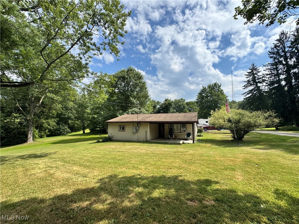 Step into comfort and functionality with this ranch-style home in East Palestine. Featuring 2 bedrooms and 1 full bathroom with accessible shower, the layout includes a living room with bay window, kitchen with separate dining area, an additional family room—ideal for entertaining or home office, a laundry/utility room with gas on demand water heater/hot water furnace/baseboard heat. 200 amp electrical service. All appliances included. Set on a corner parcel spanning three lots (totaling approx. ½ acre), the outdoor space in a quiet neighborhood setting, is peaceful and private with mature trees. Enjoy summer evenings on the covered front porch or grilling on the open rear deck, and benefit from extra storage in the large shed and oversized 24x30 detached garage. The home is wired with a back up Generac generator, delivering reliable readiness. This property provides space, versatility, and value in a peaceful setting. Perfect for first-time buyers, downsizers, or anyone craving easy, single-level living.
Seller is an Ohio licensed real estate broker. Schedule your viewing today!