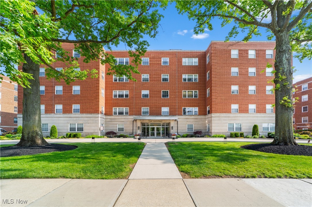 So much charm, comfort and ease of living in this wonderful 4th floor end unit condominium! Step into a beautifully appointed unit with wood flooring, soothing colors that to open light filled living spaces. An open flow, the Living Room sets the tone of the cosmopolitan vibe. Kitchen walls were opened, adding recessed and pendant lighting, to create a more fluid flow. White cabinetry, granite topped breakfast bar island, were added to increase/maximize the functionality of the Kitchen. Adjoining is the entertaining sized Dining Room with lots of wall space for breakfronts and pictures. The Primary bedroom is spacious with a double closet and an en-suite full bath. The Second bedroom, also generously sized and located right next to the second full bath, is currently used as a Family Room that has an electric fireplace and a large closet. Off the Entry Foyer is an extra room with a door that can be an office, small sitting room or more storage. There is also a large walk-in closet. Right outside the unit is a storage room with a storage space for the unit plus each floor has its own Laundry Room. The Lobby Area is warm and welcoming where you'll find the mailroom, access to the elevators, garage and a Guest Suite that residents can rent for visiting family members. At the back of the building is lovely green space with chairs, firepit and a covered table for outside entertaining. Recent improvements include the newly installed air handler, kitchen disposal and bathroom fixtures. Welcome to the prestigious community of the Diplomat Condominiums!