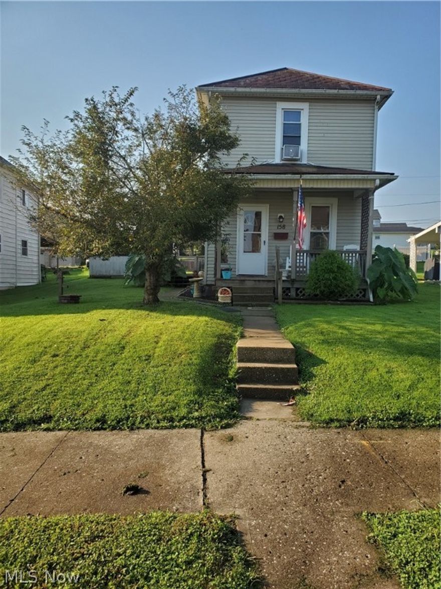 Check out this 2 Bedroom home with many updates.  Kitchen has new Kitchen Cabinets & Sink. Bathroom updated with new Shower/Tub, Vanity & Sink. Home has been painted throughout. New laminate flooring on main level.  Plumbing updated and New Rheem Furnace and A/C added in 2020!  The backyard has a fenced in area and Outside building w/electric.
